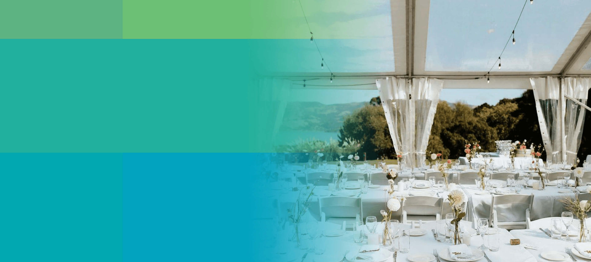 Clear-roof marquee set with white linen tables, overlooking Akaroa harbour at golden hour