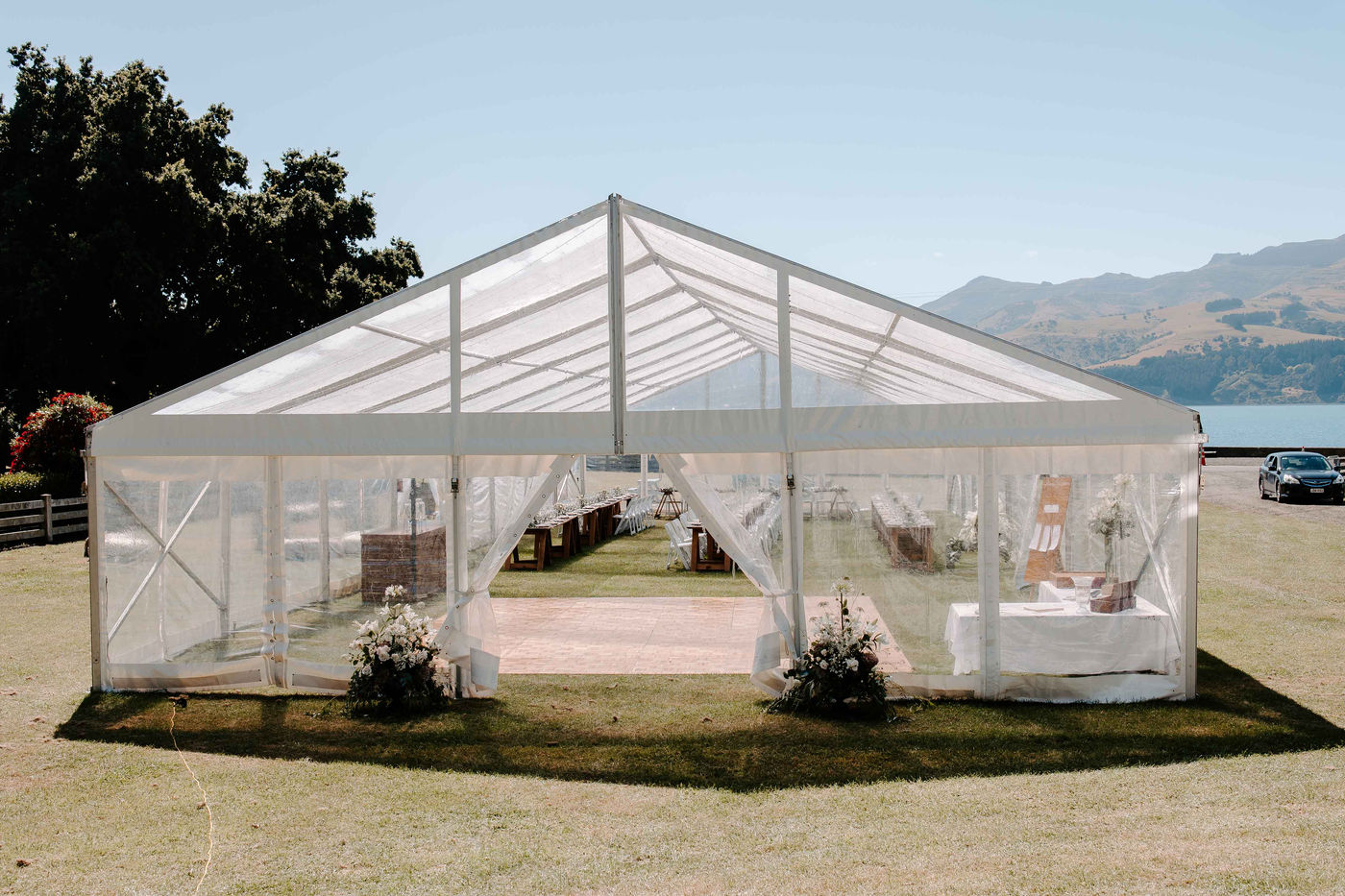 Clear-roof marquee set up overlooking Akaroa harbour